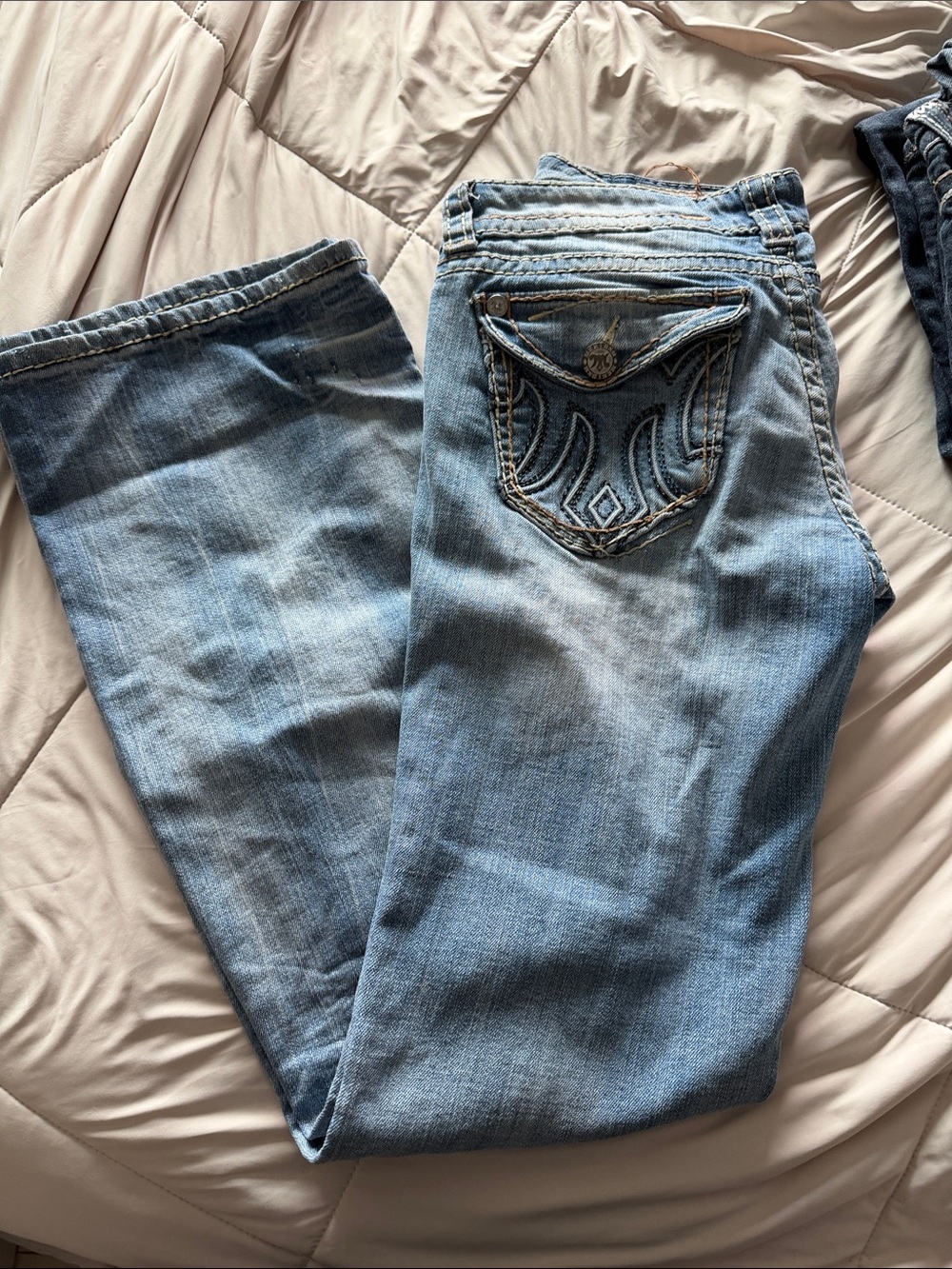 Light Blue Bootcut Jeans with Embroidered Back Pocket